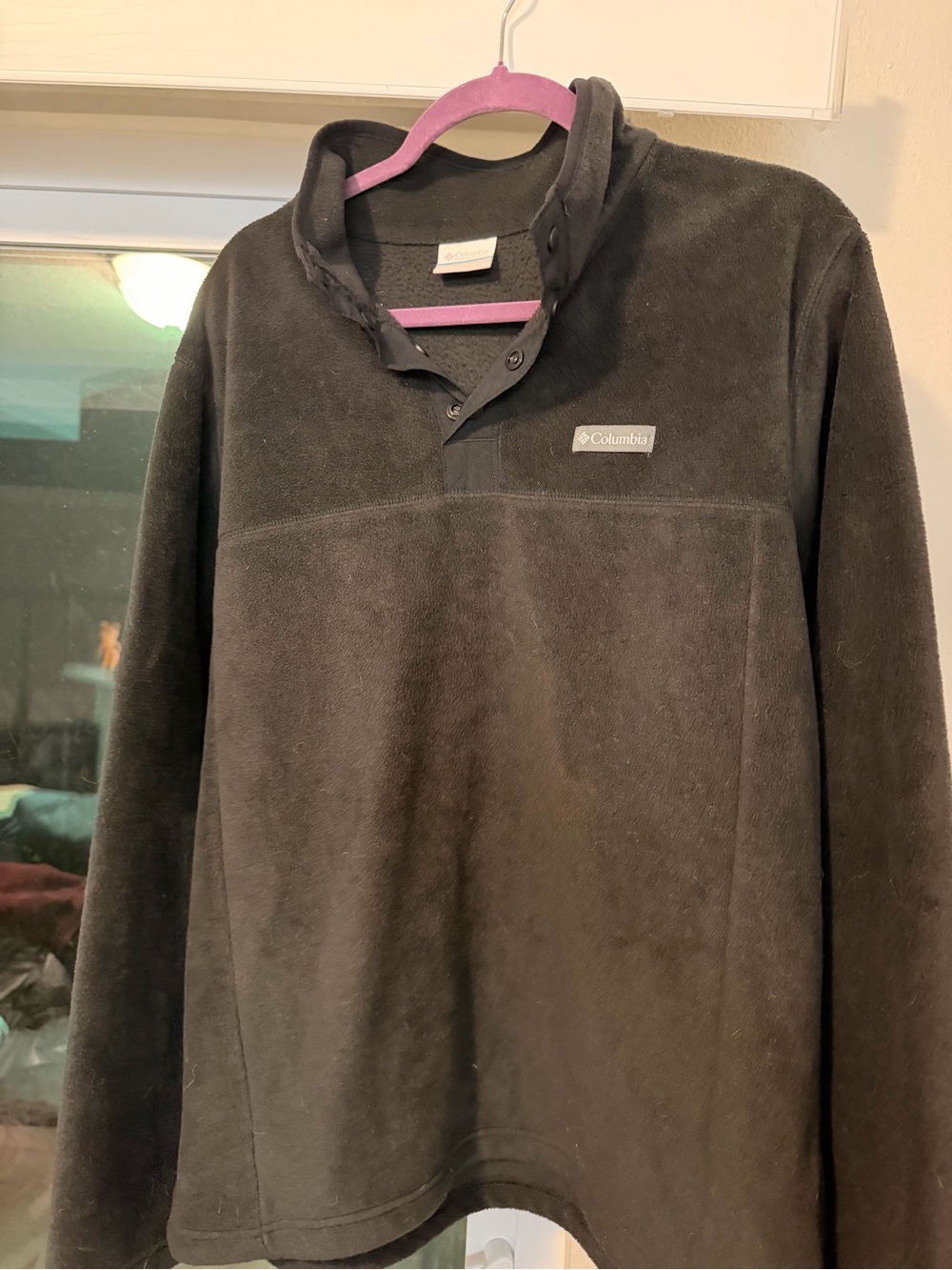 Columbia Black Fleece Jacket with Subtle Blue Tag Detail